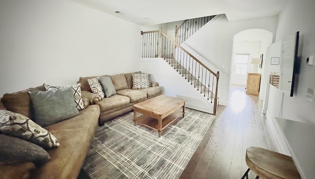 1528 Cedarbrooke Ln, Lebanon, TN 37090 - living area with arched walkways, stairs, and hardwood / wood-style floors