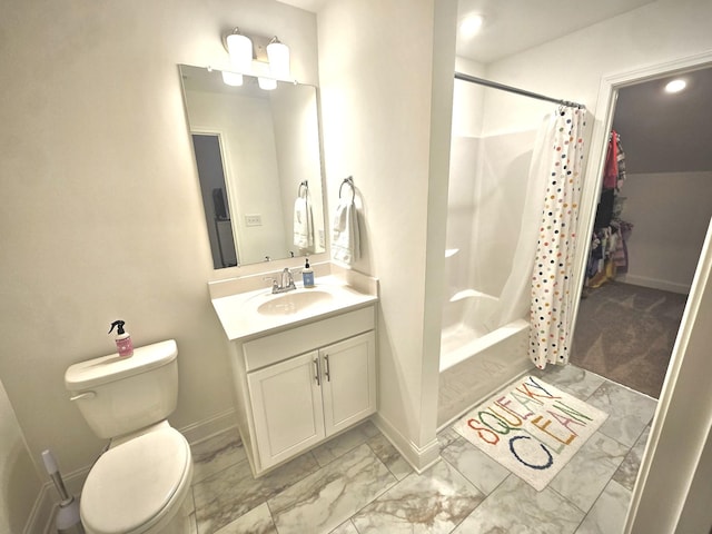 full bathroom featuring shower / bath combo with shower curtain, vanity, and toilet