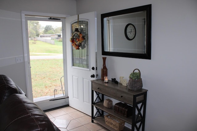 entryway featuring light tile patterned floors