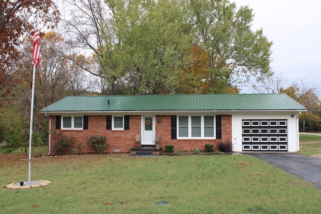 single story home with a front yard and a garage