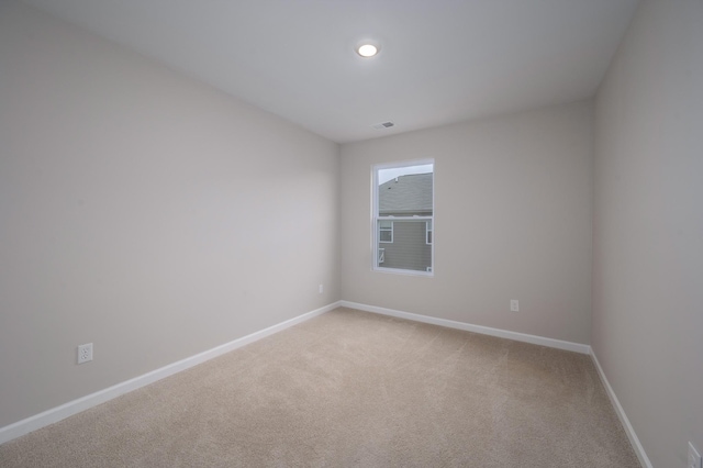 view of carpeted spare room