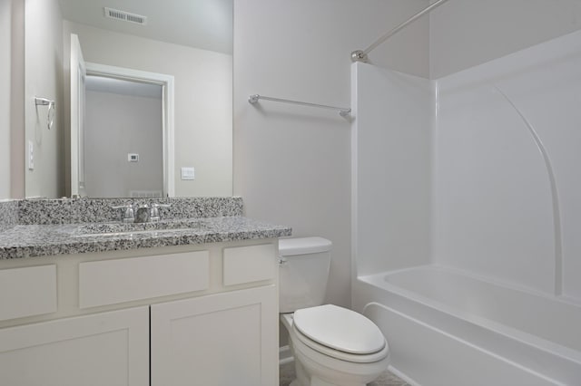 full bathroom with vanity,  shower combination, and toilet