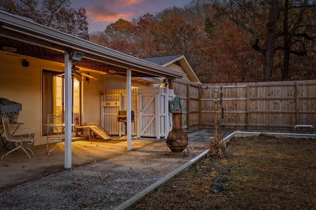 exterior space featuring an outdoor fire pit