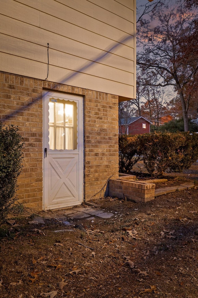 view of outdoor structure at dusk