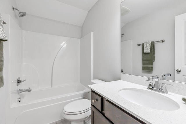 full bathroom featuring vanity, toilet, lofted ceiling, and bathing tub / shower combination