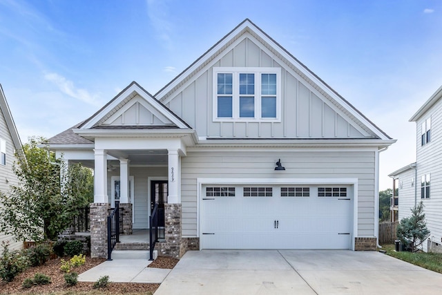 craftsman-style home with covered porch and a garage