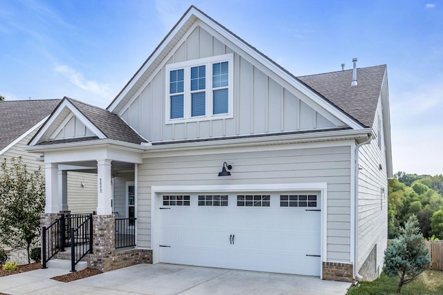 craftsman house with a garage