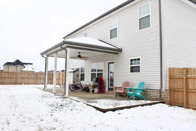 view of snow covered property