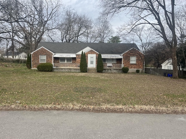 single story home with a front yard