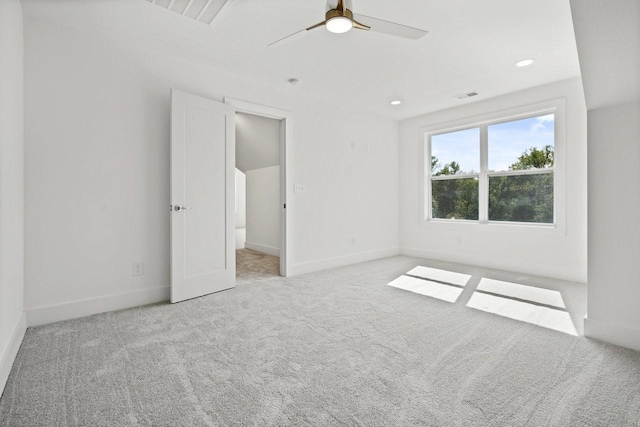 unfurnished bedroom featuring ceiling fan and light carpet