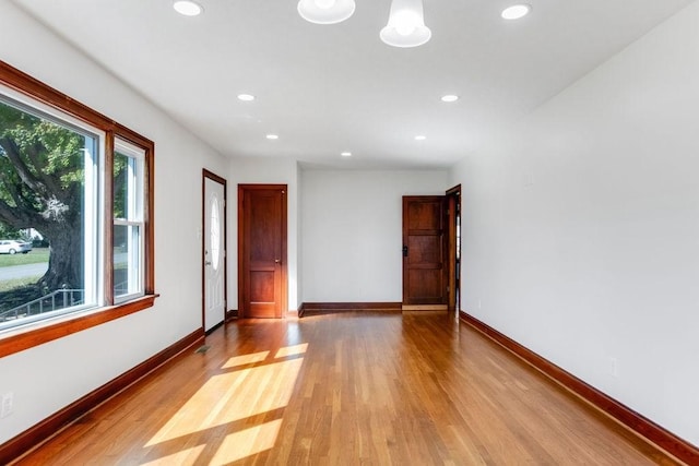 empty room with light wood-type flooring