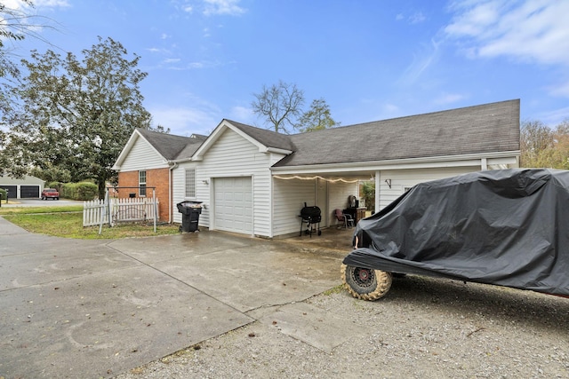 view of property exterior featuring a garage