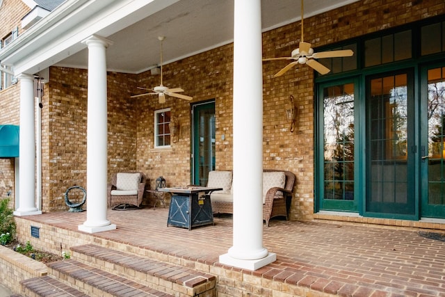 view of patio with ceiling fan, french doors, and covered porch