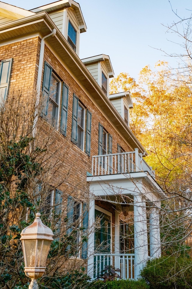 view of property exterior with a balcony