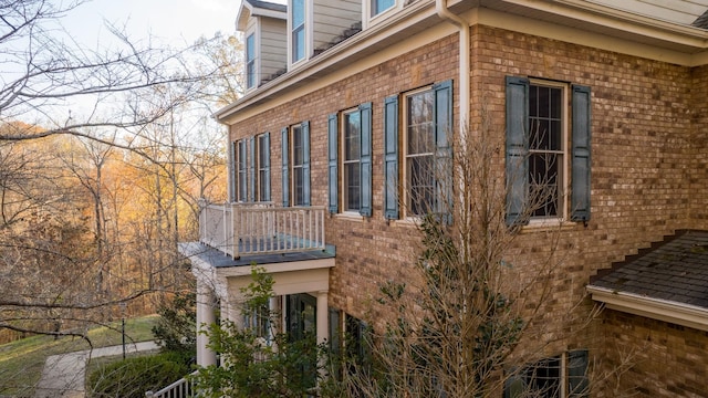 view of property exterior with a balcony