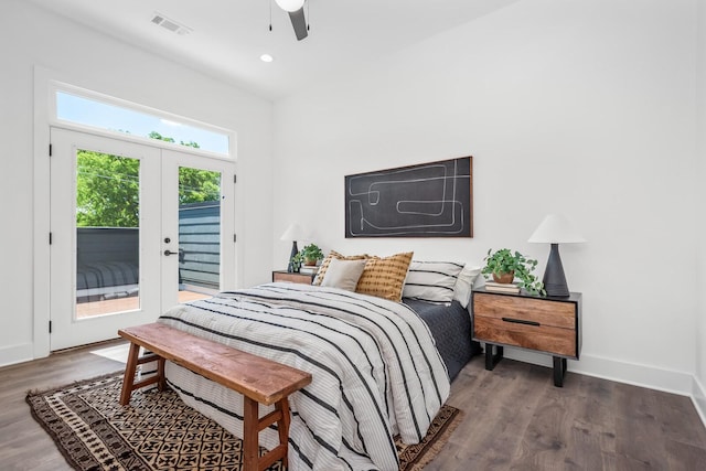 bedroom featuring access to exterior, french doors, dark hardwood / wood-style flooring, and ceiling fan