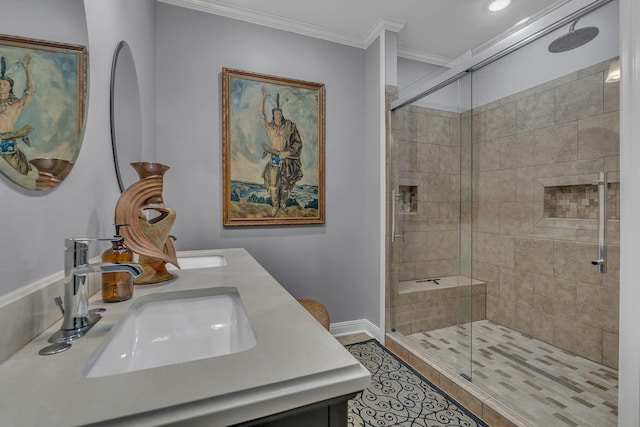 bathroom with tile patterned flooring, vanity, a shower with shower door, and crown molding