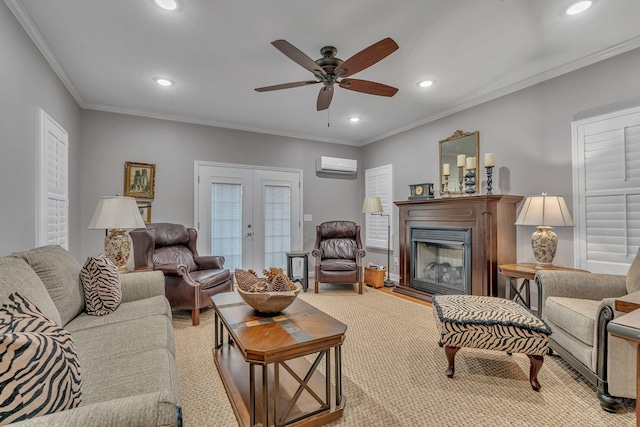 living room featuring an AC wall unit, crown molding, french doors, and ceiling fan