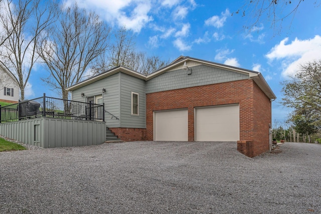 view of property exterior with a deck