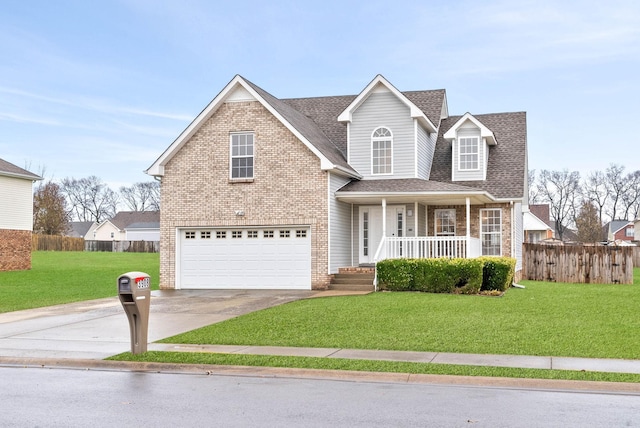 front of property featuring a porch, a garage, and a front lawn