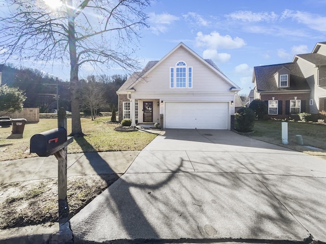 front of property with a front yard and a garage