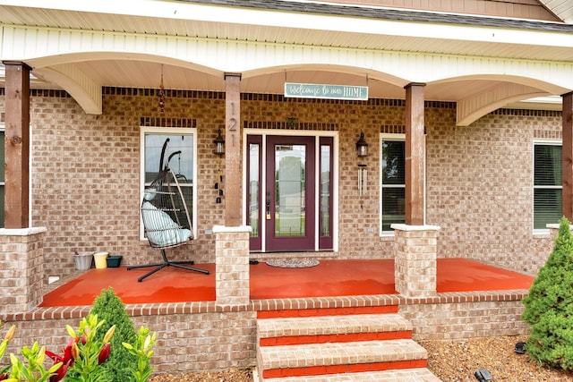 doorway to property with a porch