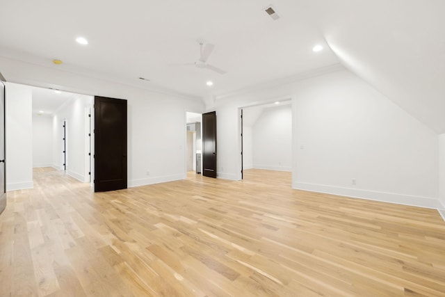 unfurnished room featuring ceiling fan, crown molding, and light hardwood / wood-style flooring