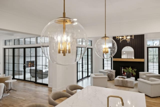 interior space with a chandelier and hardwood / wood-style flooring