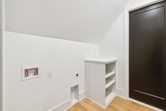 laundry area with hookup for an electric dryer, hookup for a washing machine, and hardwood / wood-style flooring