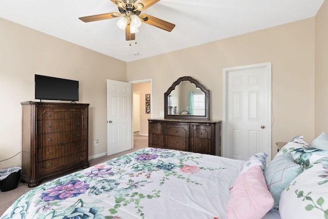 carpeted bedroom featuring ceiling fan