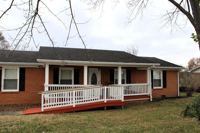 ranch-style home featuring a front yard