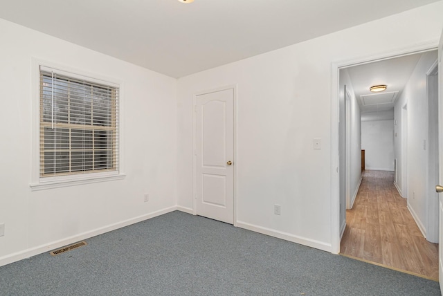 unfurnished bedroom featuring hardwood / wood-style floors