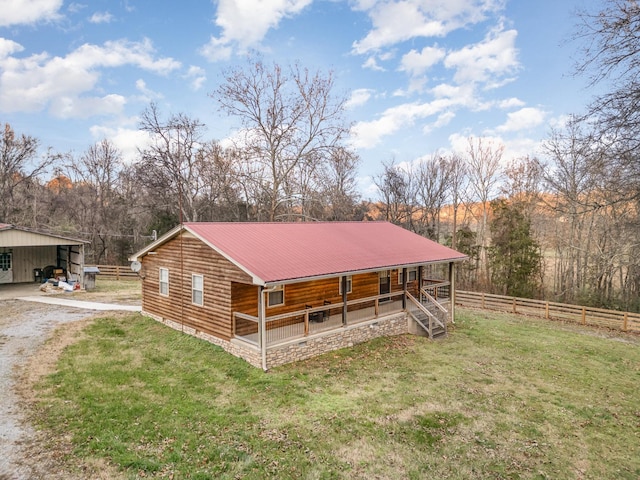 view of front of home with an outdoor structure