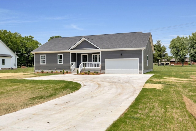 single story home featuring covered porch, a front yard, and a garage