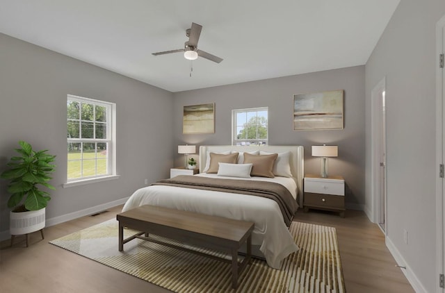 bedroom featuring ceiling fan and light hardwood / wood-style flooring