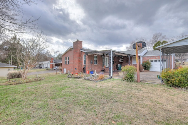 view of side of property with a yard and a garage