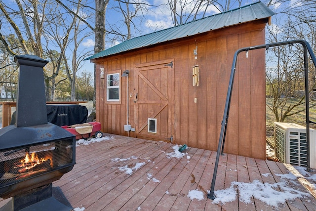 deck with exterior fireplace