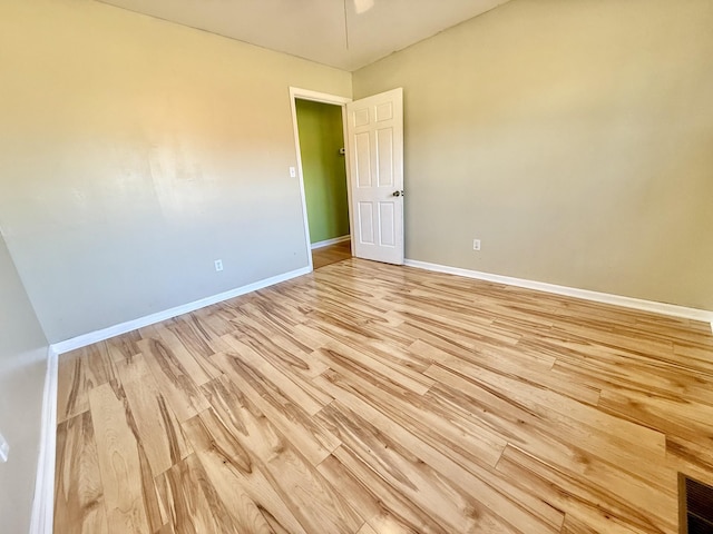 empty room with light wood-type flooring