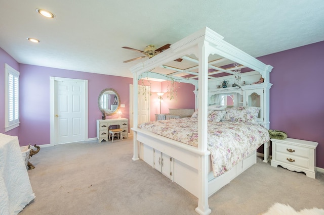 bedroom with light carpet and ceiling fan