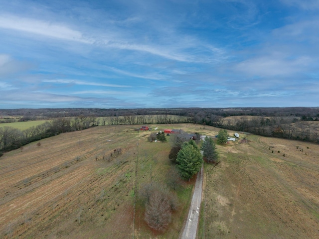 birds eye view of property with a rural view