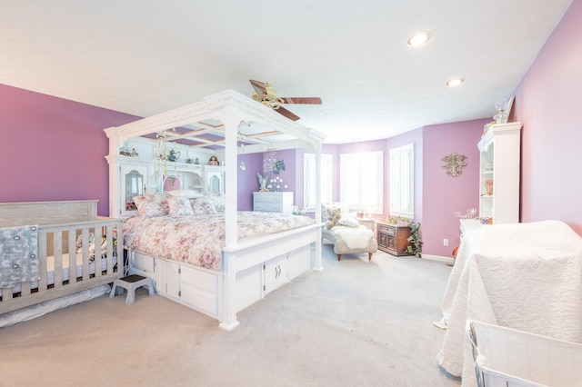 carpeted bedroom featuring ceiling fan