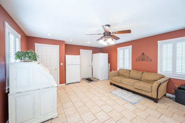 living room with ceiling fan