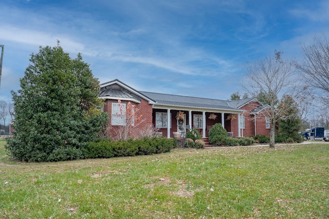 view of front of house with a porch and a front lawn