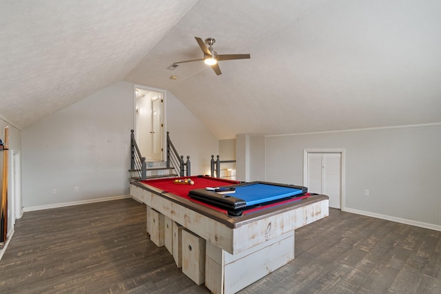 game room featuring dark wood-type flooring, billiards, vaulted ceiling, ceiling fan, and a textured ceiling