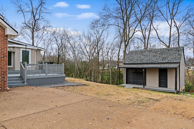 view of yard featuring a wooden deck