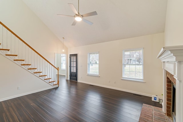 unfurnished living room featuring ceiling fan, a fireplace, high vaulted ceiling, and dark hardwood / wood-style floors