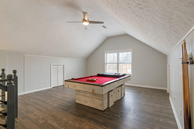 recreation room with a textured ceiling, dark wood-type flooring, vaulted ceiling, and billiards