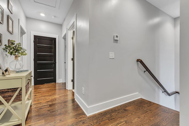 corridor with dark wood-type flooring