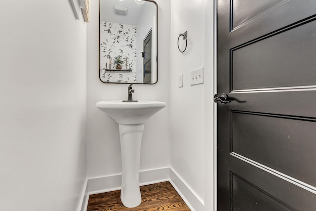 bathroom featuring wood-type flooring