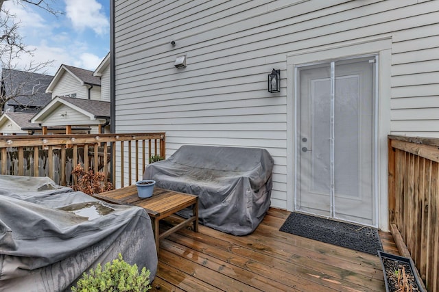 wooden deck with area for grilling